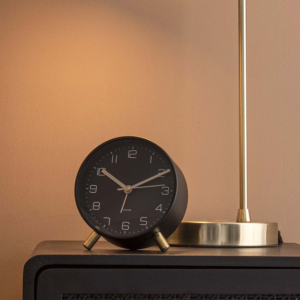 Karlsson Lofty Alarm Clock Black on black side table at House