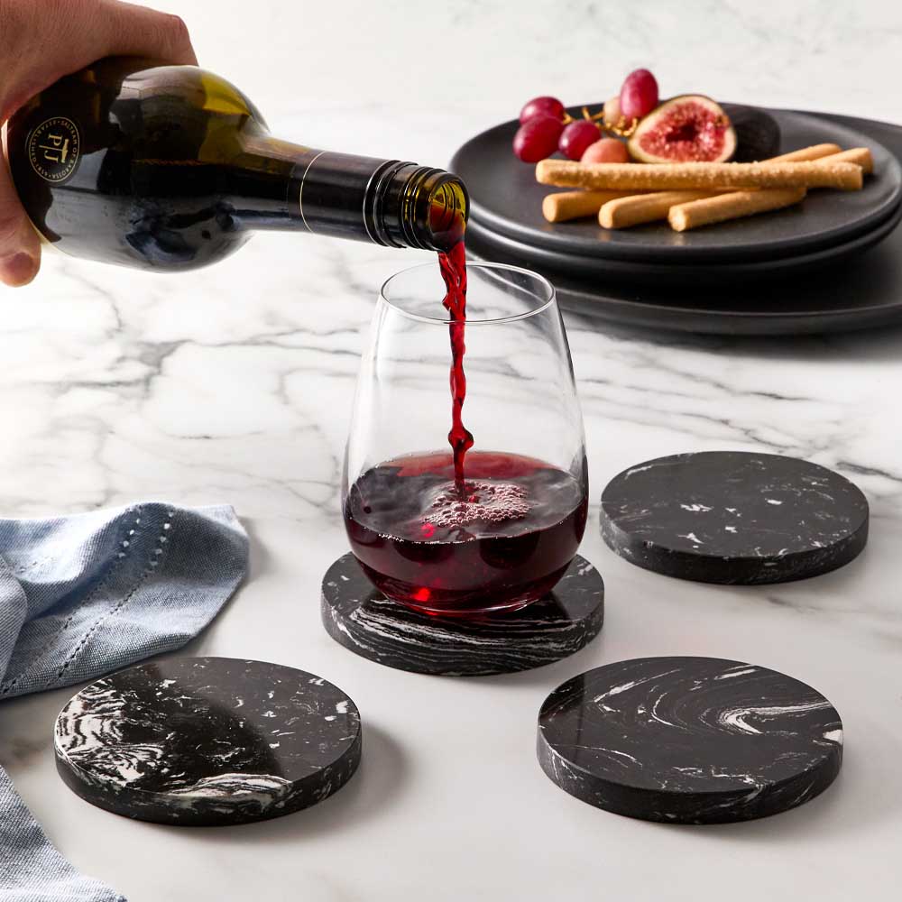 Set of 4 Black Marble Coasters with glass of red wine - House