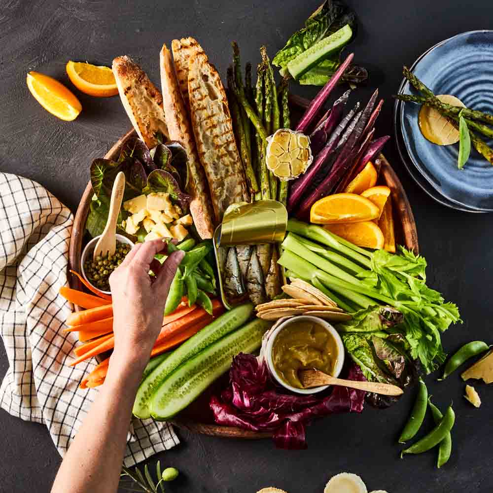 round wooden serving board filled with ingredients