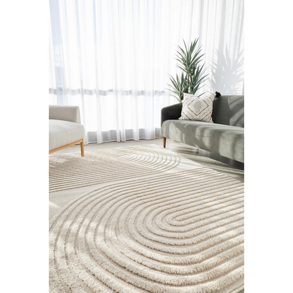 Rug Culture Lotus Abbey Rug in Beige at House. Rug with arch detail in lounge room