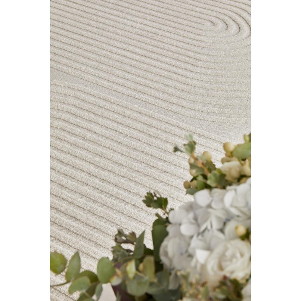 Rug Culture Lotus Abbey Rug in Beige at House. Rug with arch detail.
