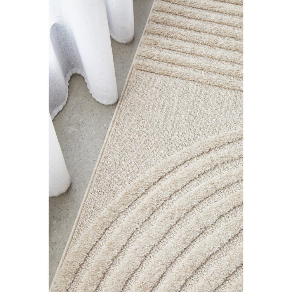 Rug Culture Lotus Abbey Rug in Beige at House. detail shot of Rug with arch detail.