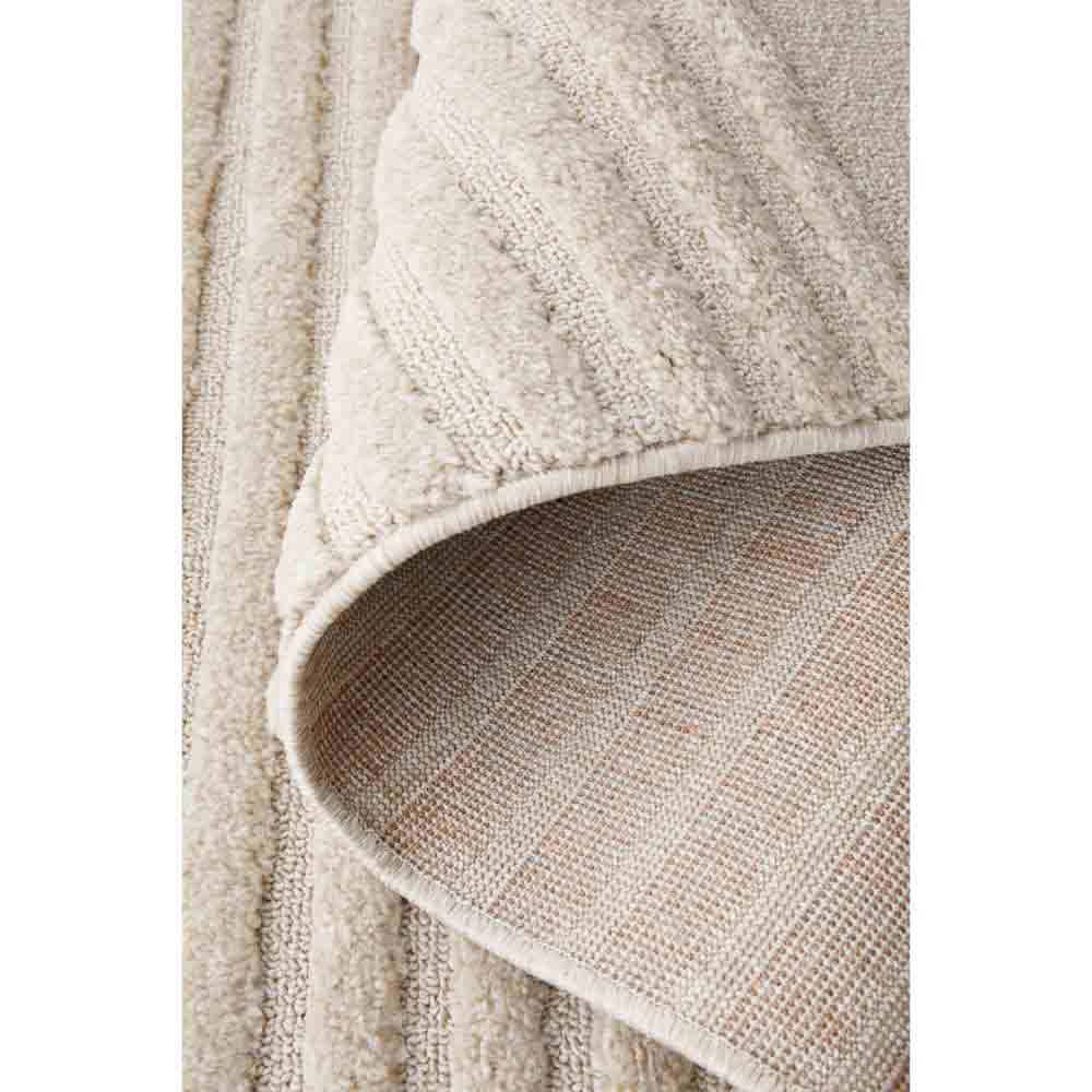 Rug Culture Lotus Abbey Rug in Beige at House. Rug with arch detail.