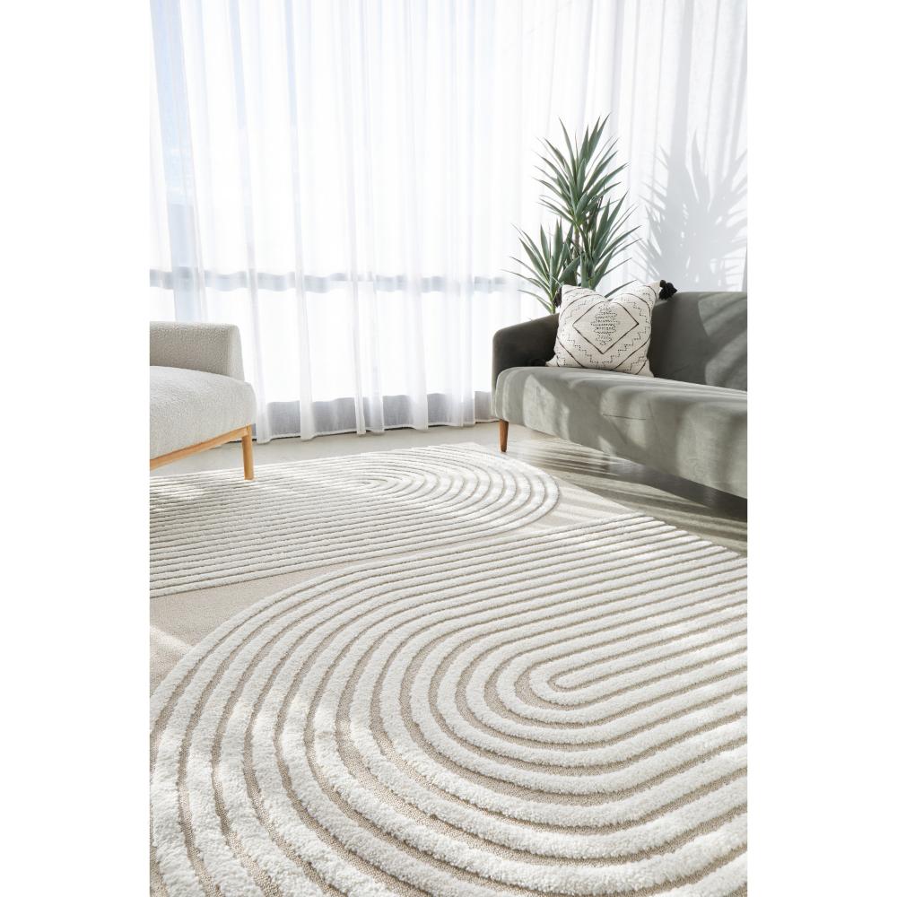 Rug Culture Lotus Abbey Rug in Mixed Beige and White at House. Rug with arch detail in lounge room