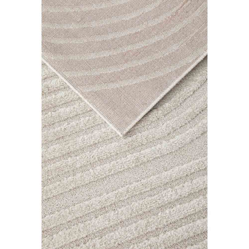 Rug Culture Lotus Carl Rug in beige at House. detail shot of Rug with oval detail.