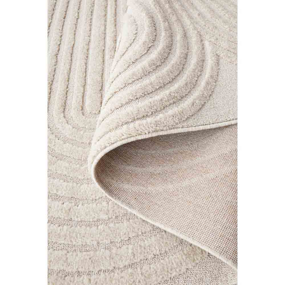 Rug Culture Lotus Carl Rug in beige at House. close up of Rug with oval detail.
