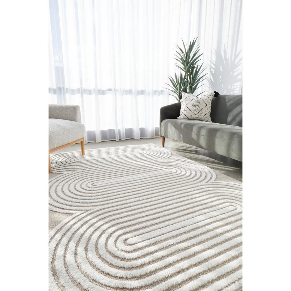 Rug Culture Lotus Carl Rug in mixed beige and white at House. Rug with oval detail.