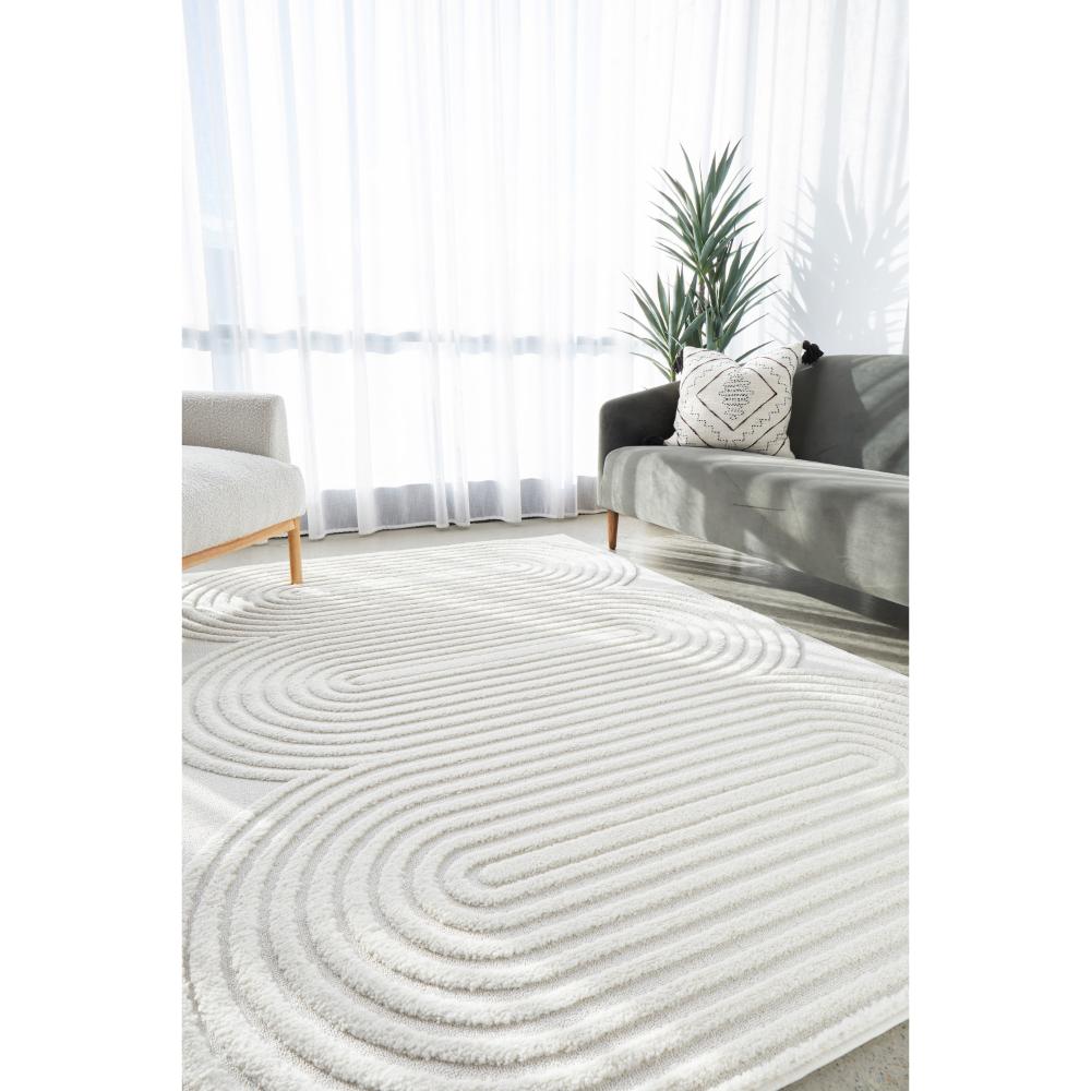 Rug Culture Lotus Carl Rug in white at House. Rug with oval detail in loungeroom