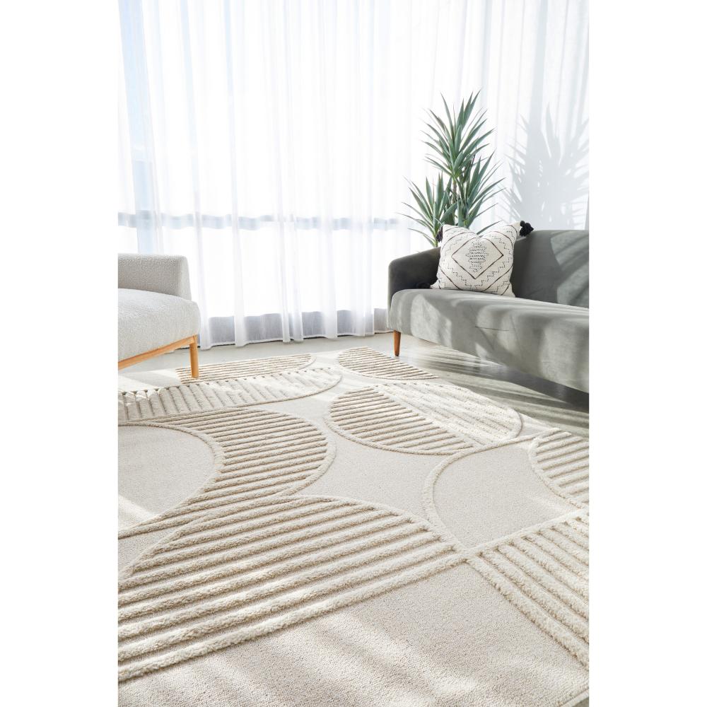 Rug Culture Lotus Leo Rug in Beige in a lounge room at House