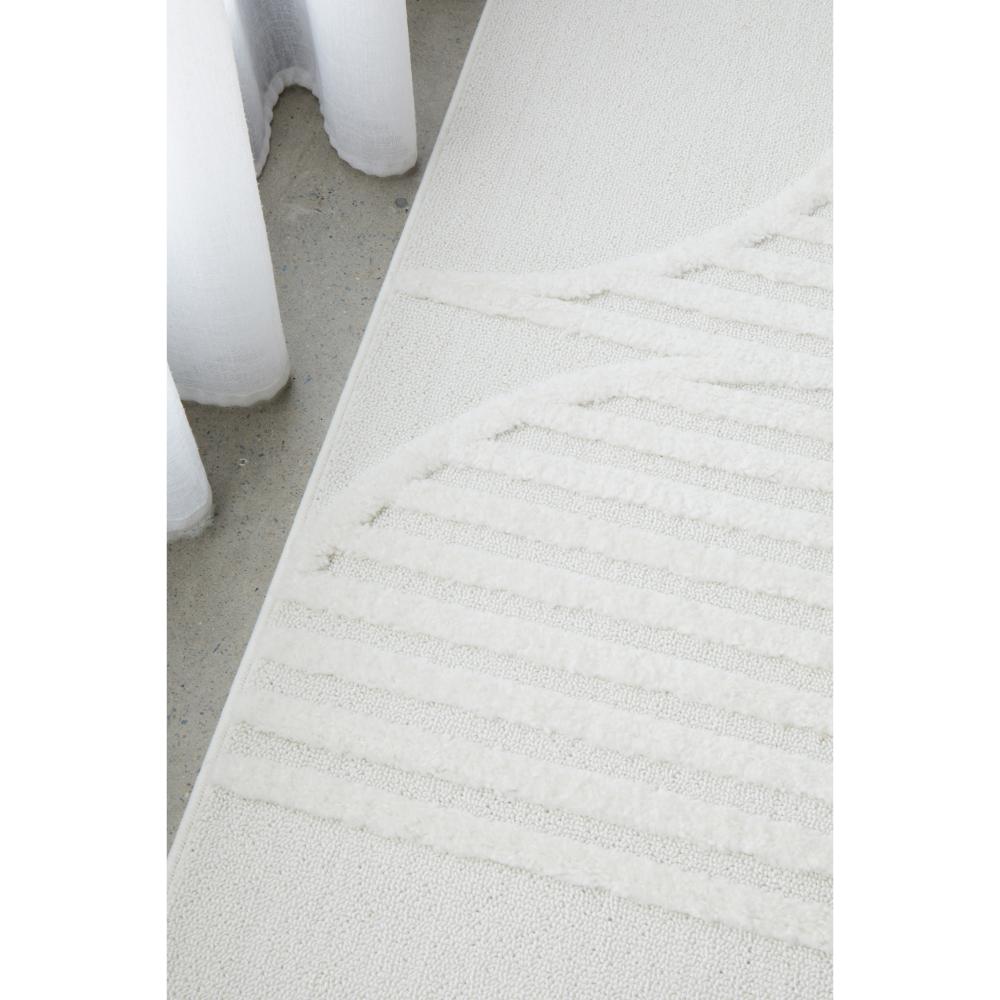 Rug Culture Lotus Leo Rug in White with art deco detail at House