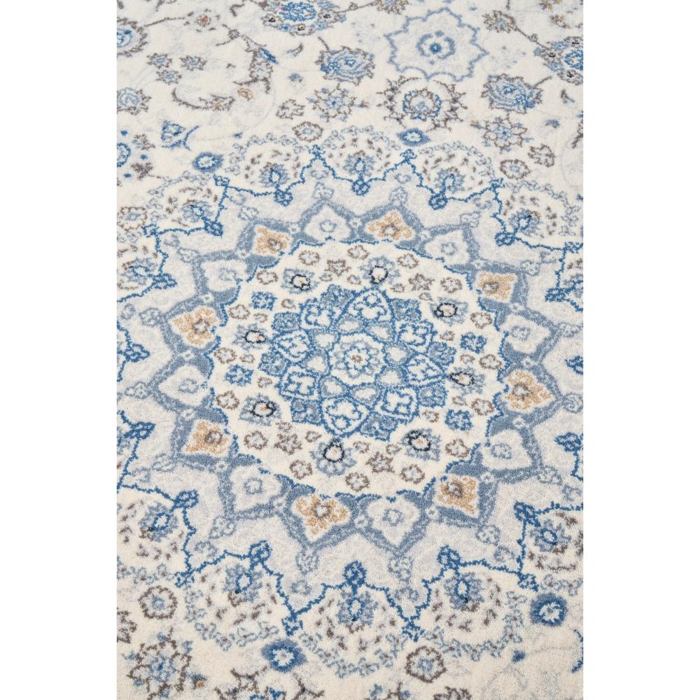 Vintage look blue and cream motif on wool rug - House
