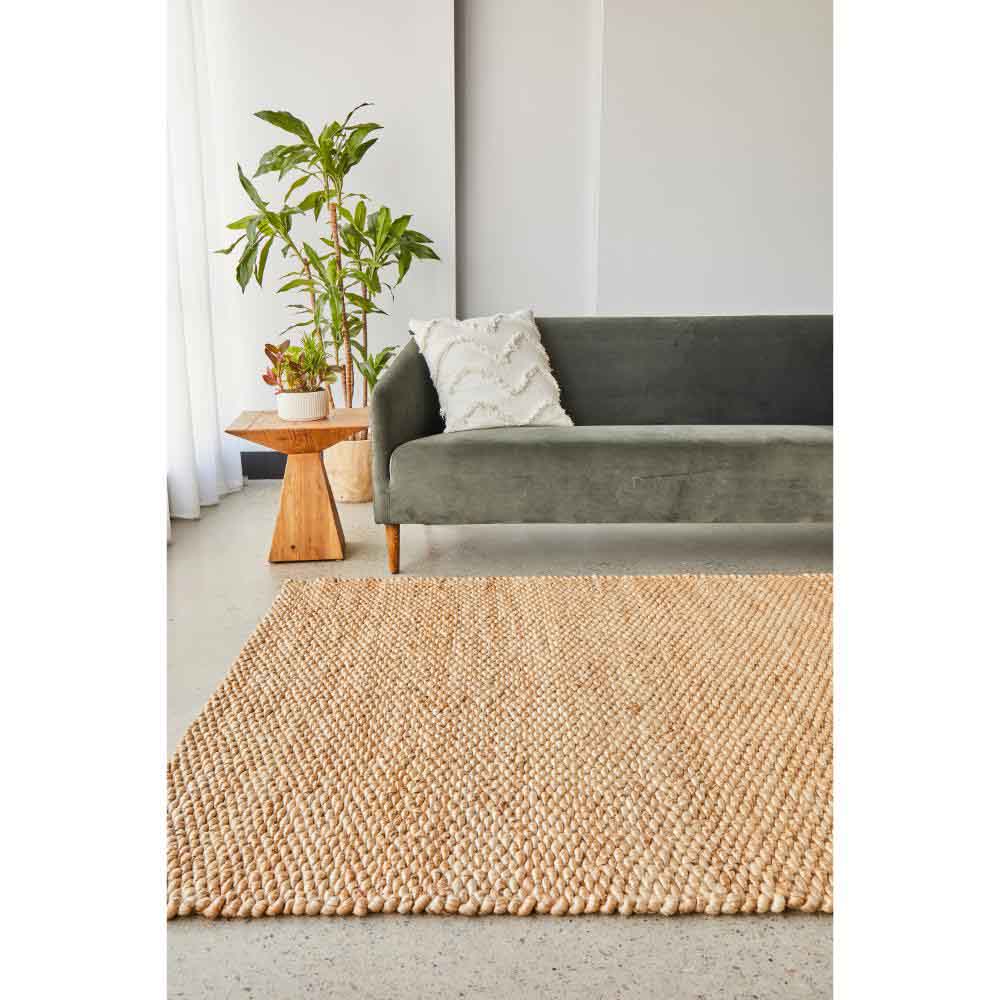 Natural Brown Jute Hampton Rug with lounge and side table - House