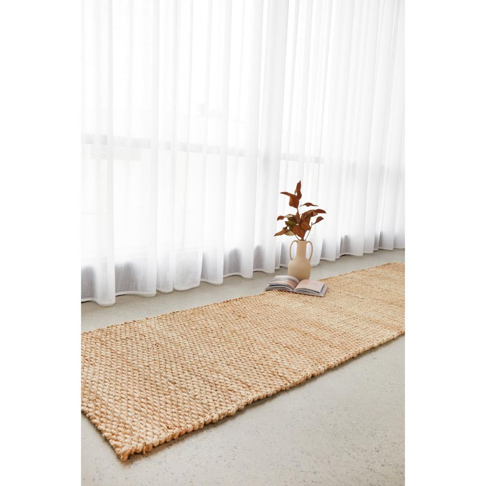 Natural Brown Jute Hampton Rug by a window - House