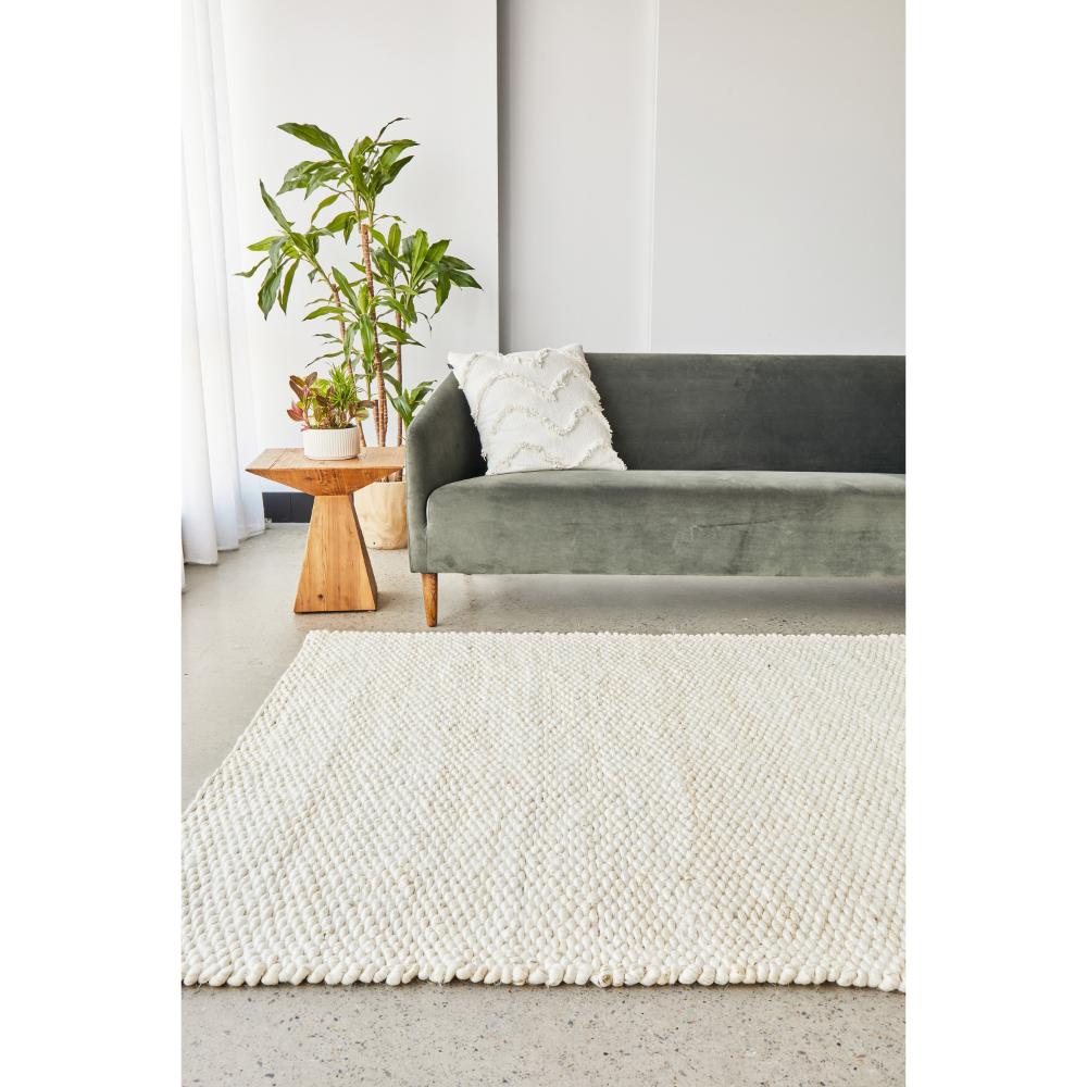 Cream white Jute Hampton Rug with lounge and side table - House
