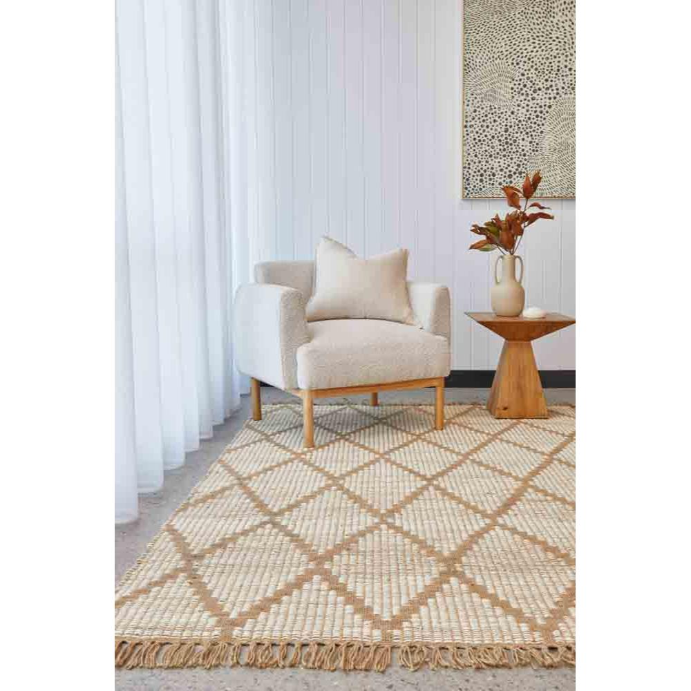 beige diamond design rug in a loungeroom with armchair - House