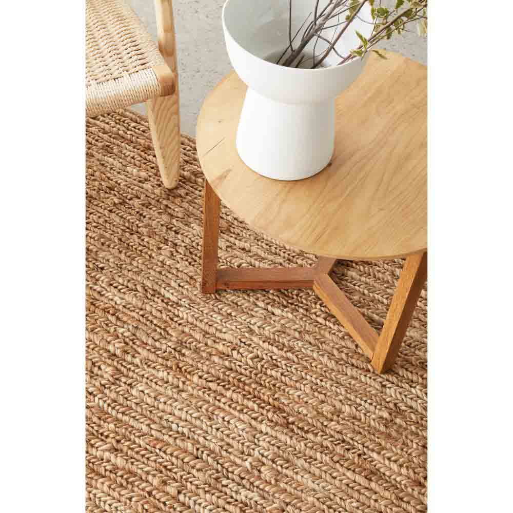 natural brown beige jute rug with armchair and table - House