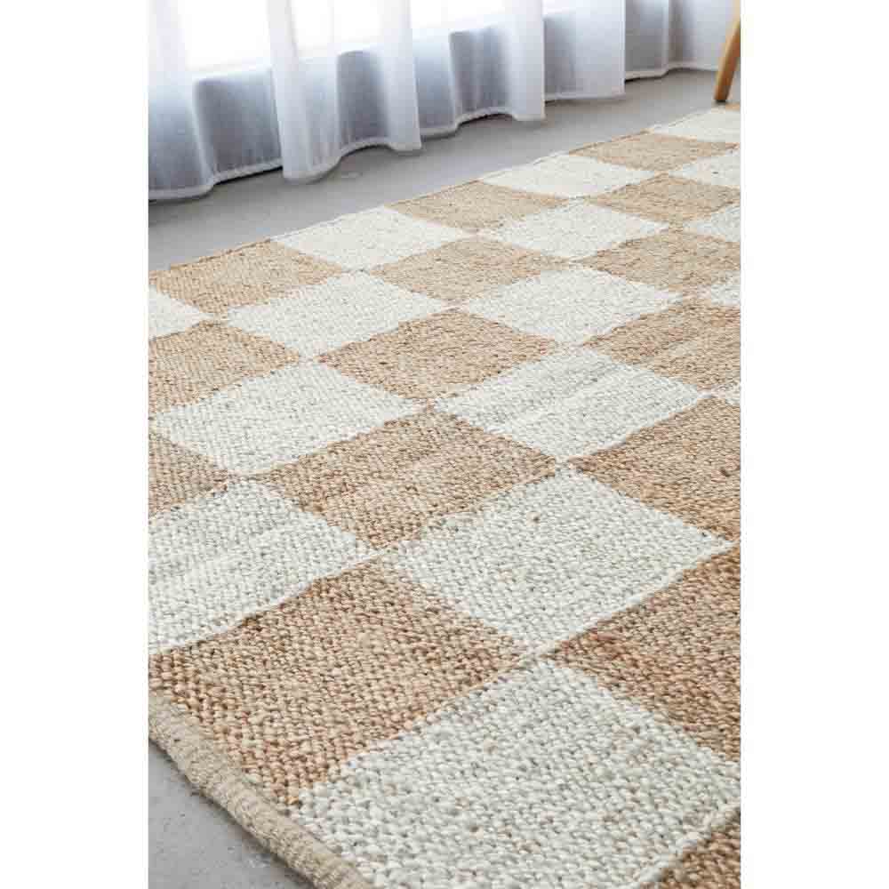 warm beige checkboard jute rug by the window - House