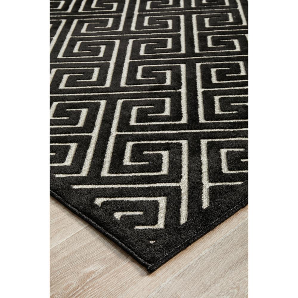 black and beige geometric swirl rug detail image - House