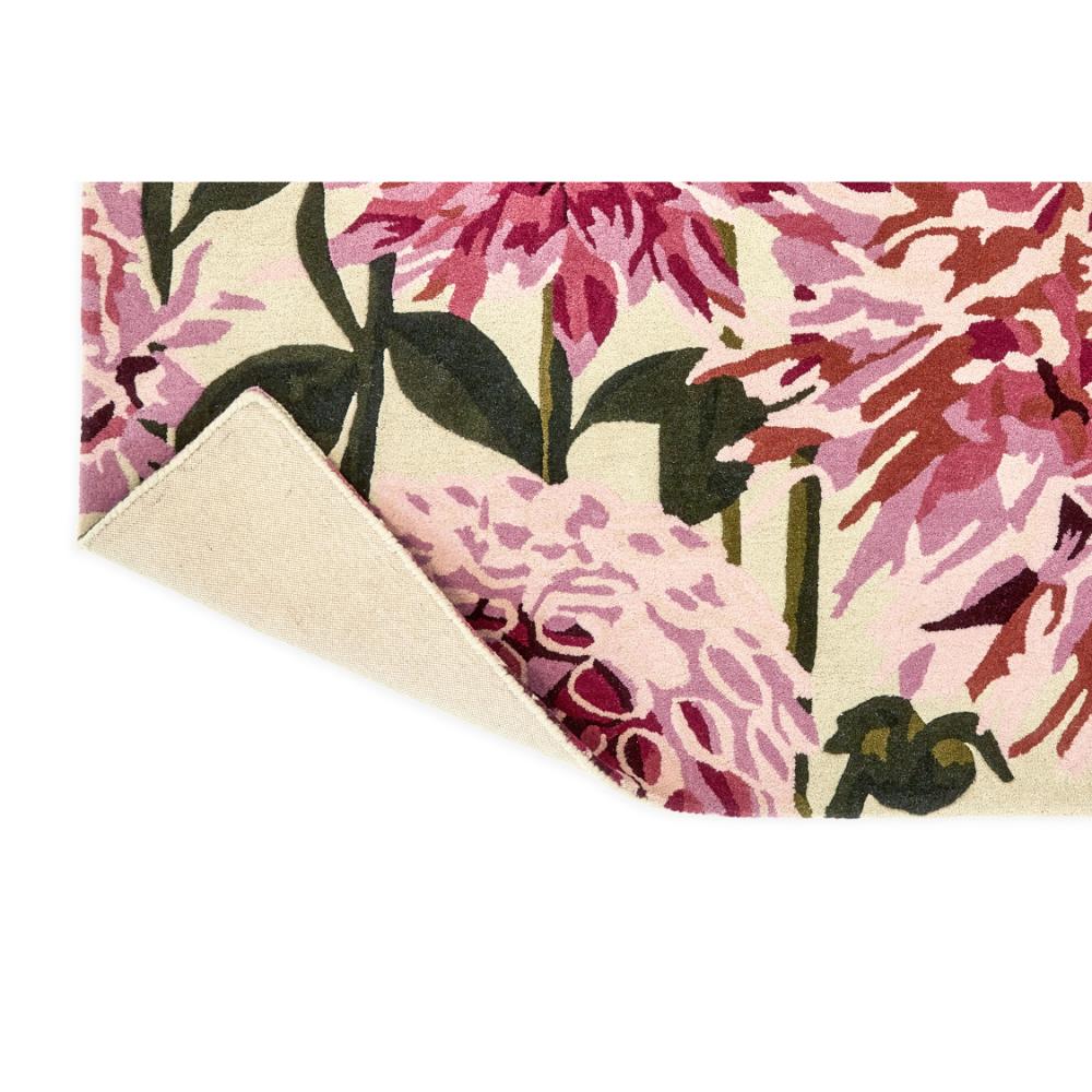 designer large pink dahlia flower wool rug detail shot - House