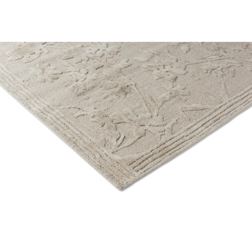 natural beige flower embossed rug detail image - House