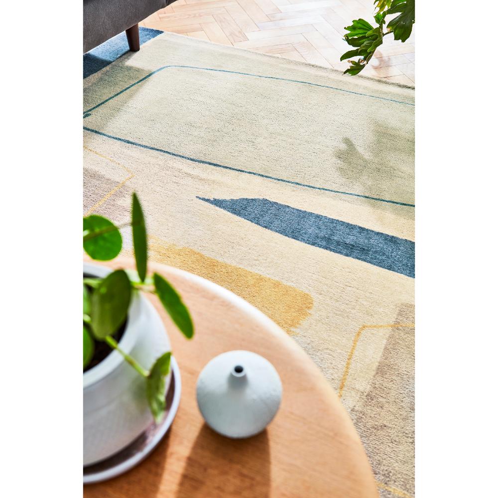 multicolour abstract blocks wool rug in loungeroom - House