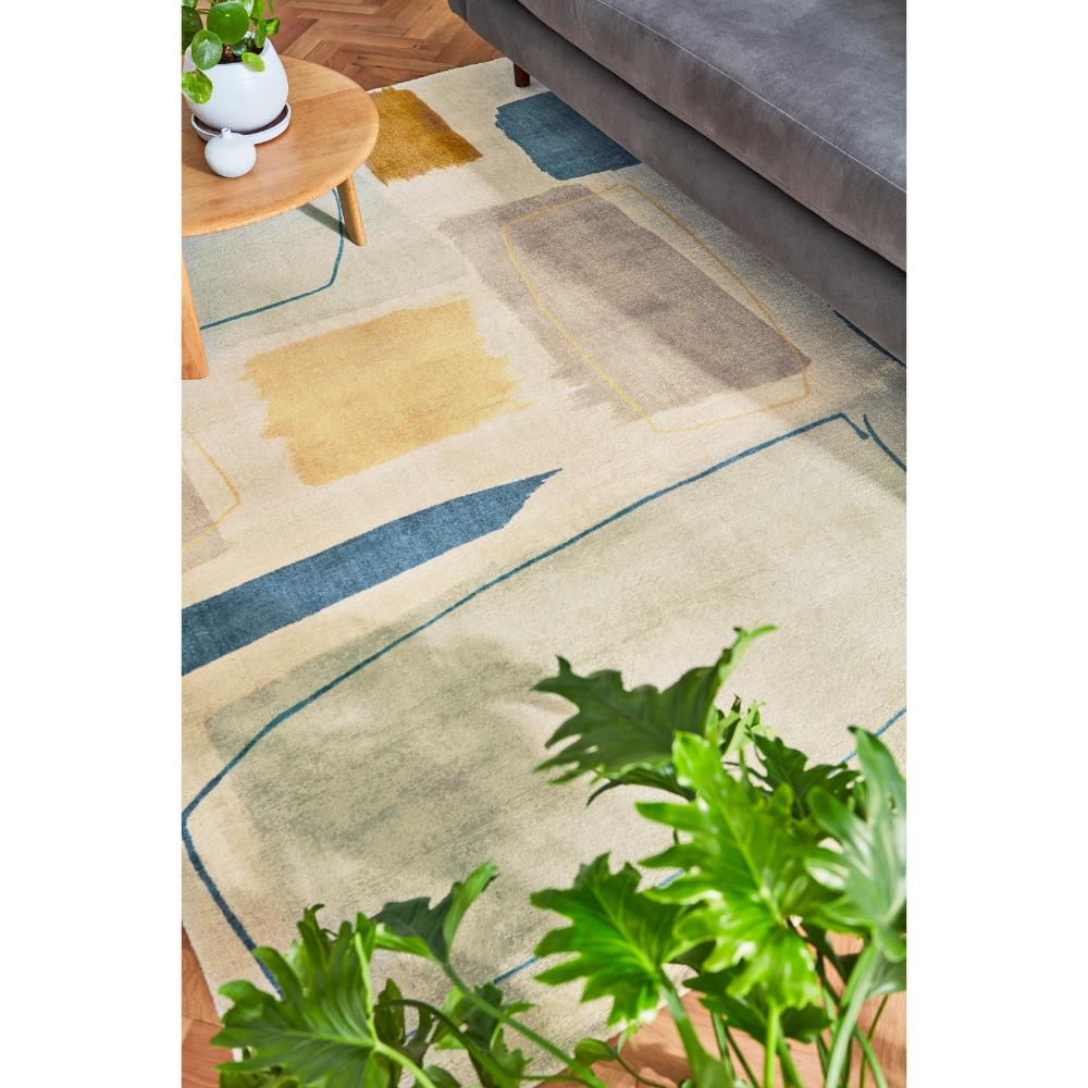 multicolour abstract blocks wool rug in loungeroom - House