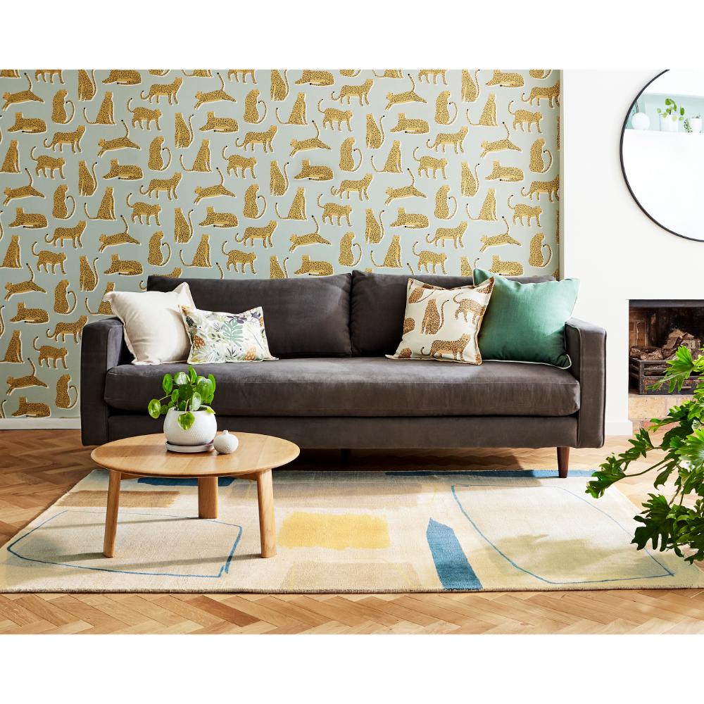 multicolour abstract blocks wool rug in loungeroom - House