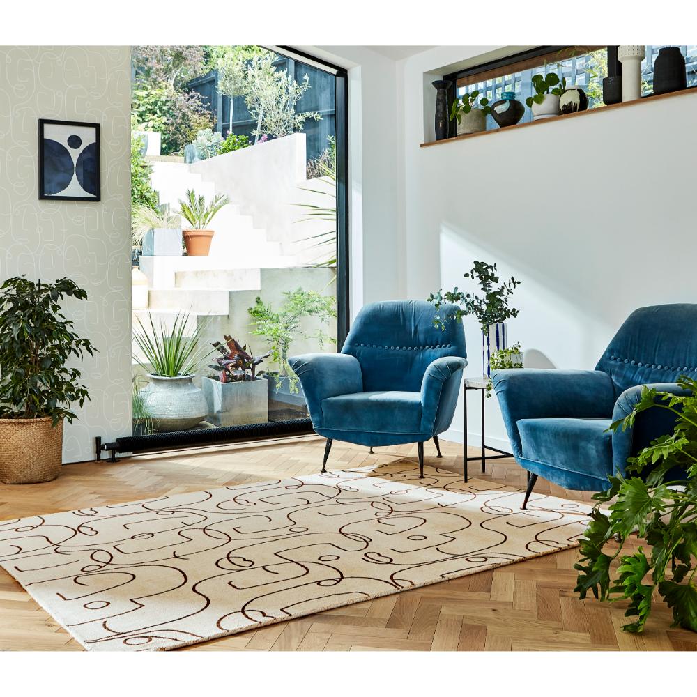 abstract face design Wool Rug with blue armchairs - House