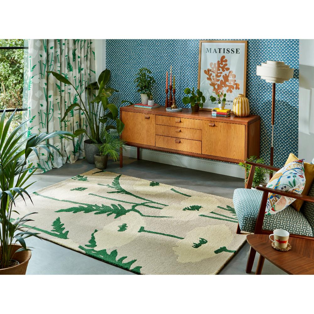 beige wool rug with cream poppies in sitting area - House