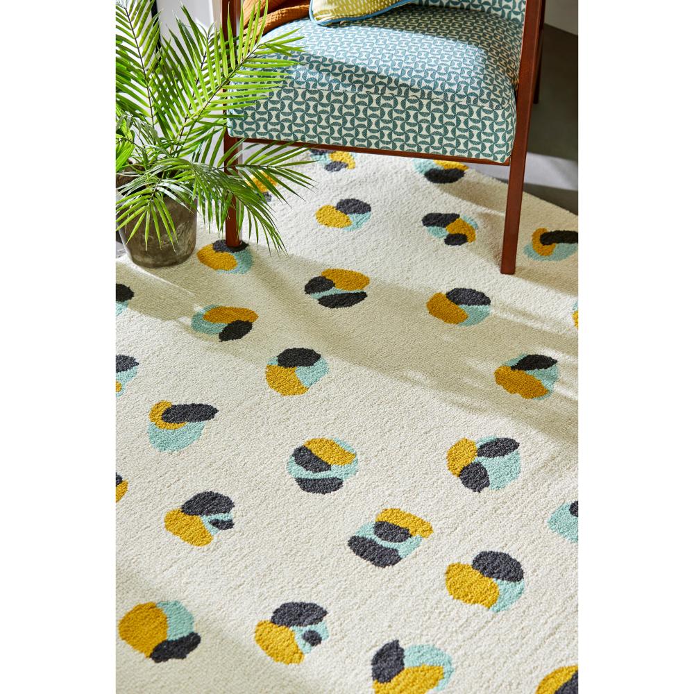 Cream Leopard Dots Wool Rug with armchair - House