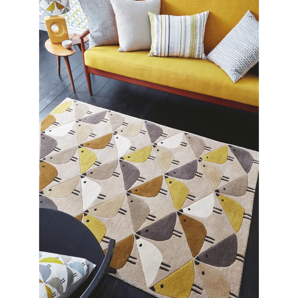 yellow and grey geo bird print wool rug in loungeroom - House