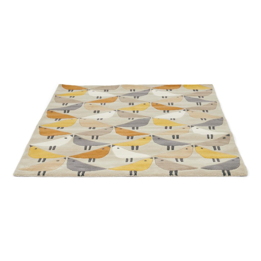yellow and grey geo bird print wool rug angled image - House