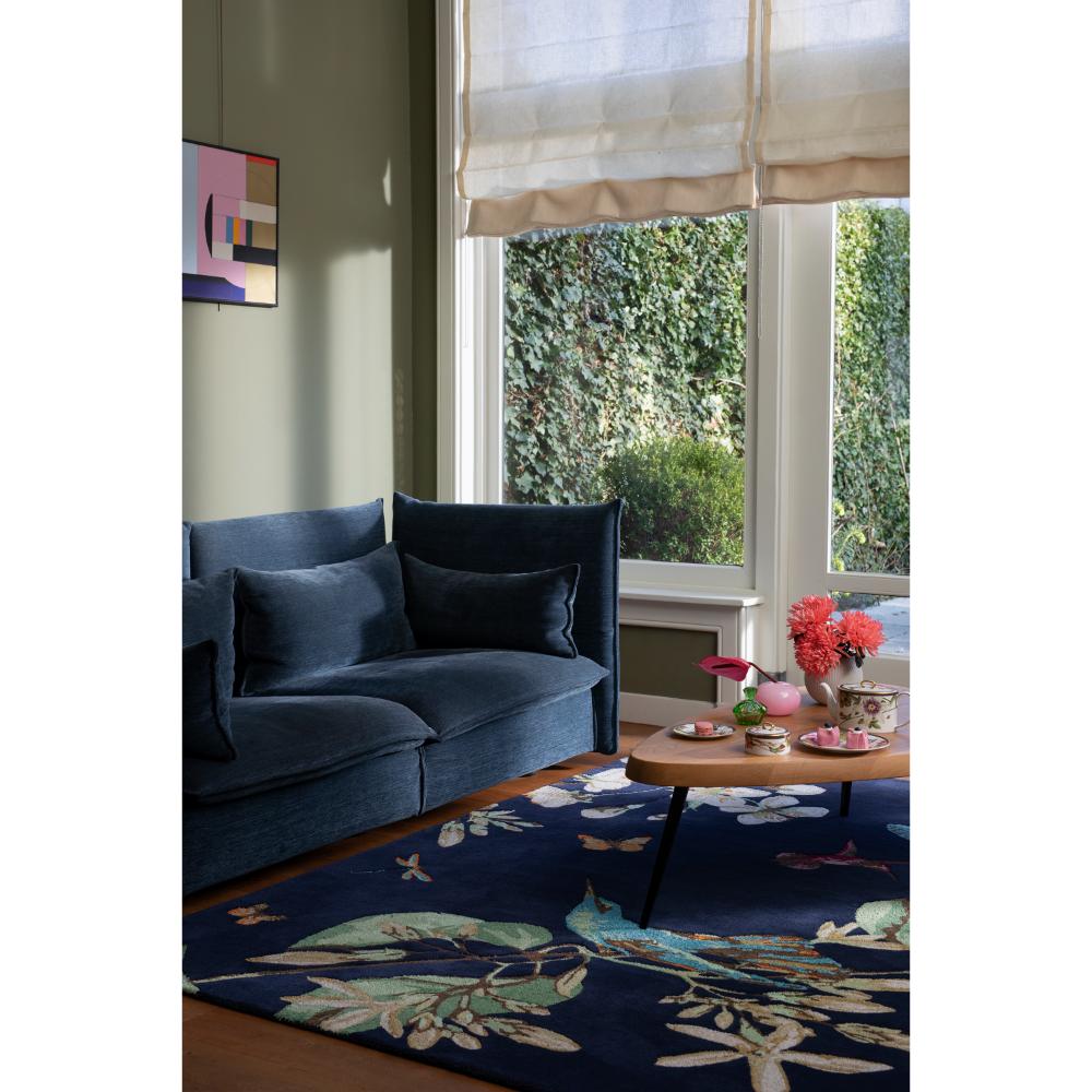 Hummingbird and floral blue wool rug in loungeroom - House