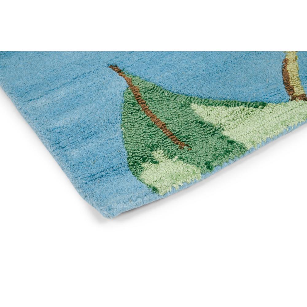 Hummingbird and floral blue wool rug detailed image - House