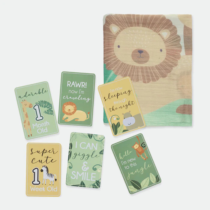 Set of baby milestone cards with lion design and text on a white background