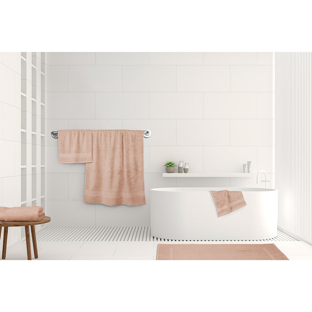 Algodon St Regis Bath Towels Dusk pink at House. Bath towel, bath sheet, bath mat, hand towel and facewasher displayed in a bathroom