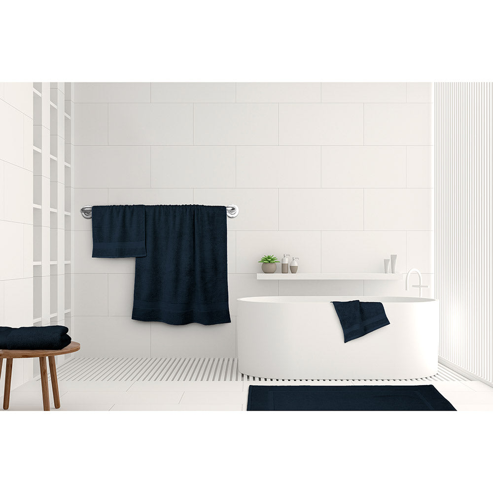 Algodon St Regis Bath Towels Navy blue at House. Bath towel, bath sheet, bath mat, hand towel and facewasher displayed in a bathroom