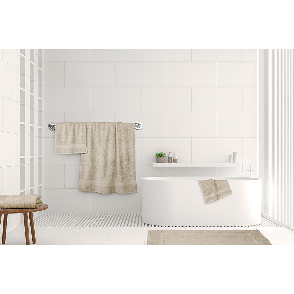 Algodon St Regis Bath Towels Stone Cream at House. Bath towel, bath sheet, bath mat, hand towel and facewasher displayed in a bathroom