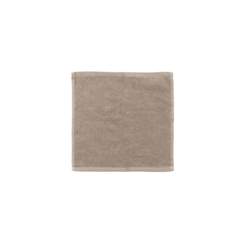 The Bambury Chateau face washer in latte.