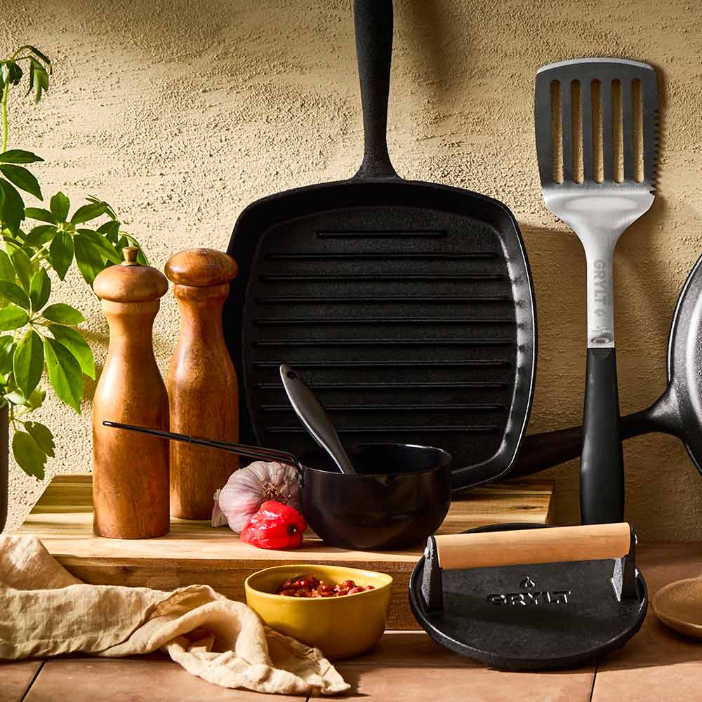 collection of outdoor cooking pans utensils and accessories - House