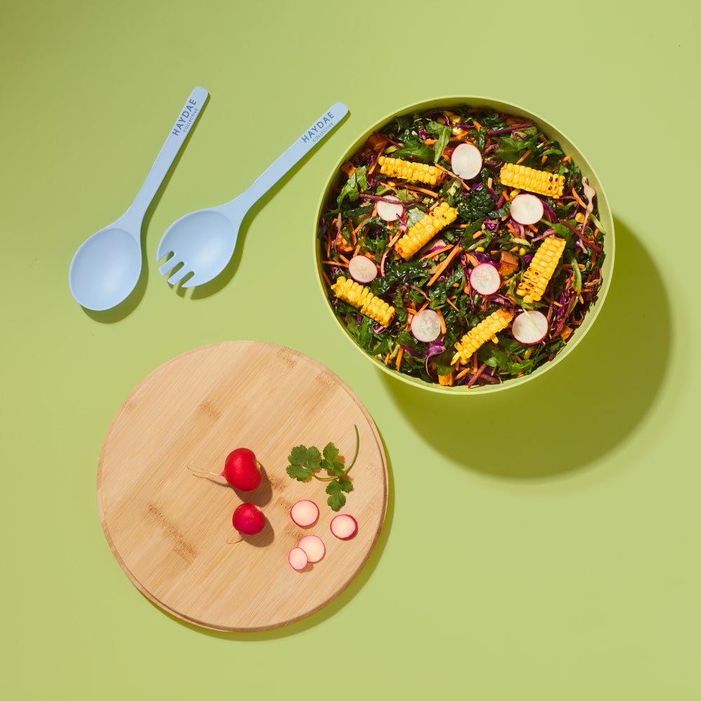 Salad Bowl filled with salad With Servers and lid - House