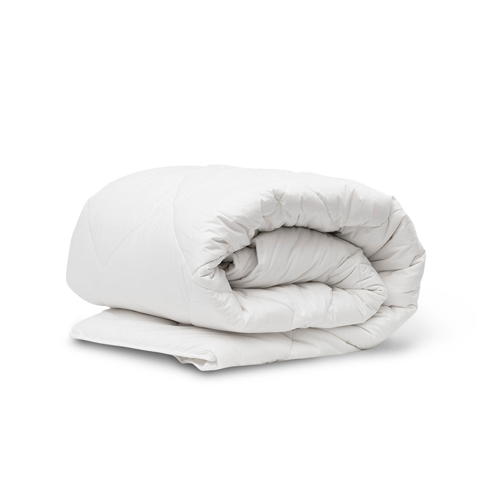 Tontine Farmhouse Lightweight Washable Wool Quilt rolled up at House