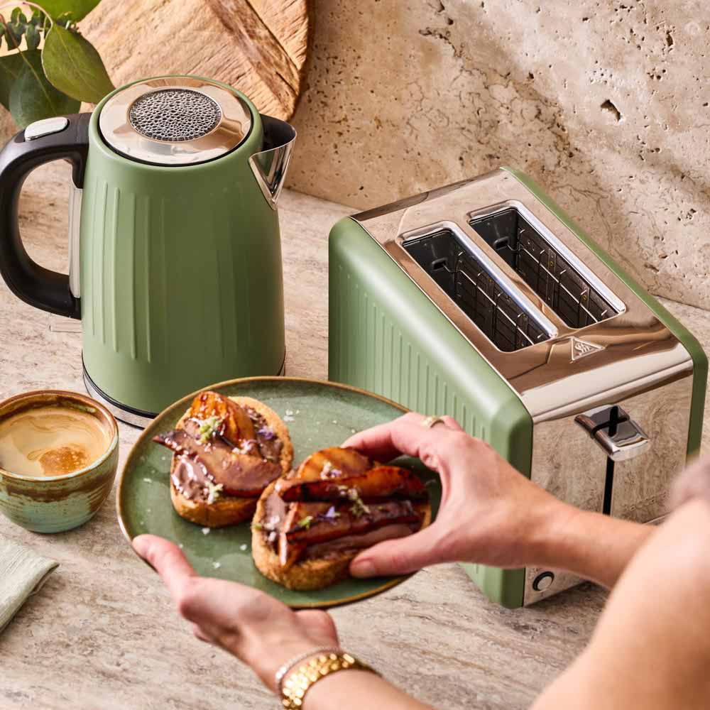 green kettle and green toaster on the kitchen counter
