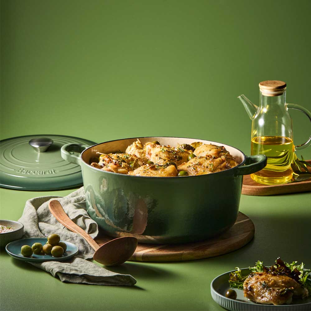 chicken casserole in green cast iron dutch french oven - House
