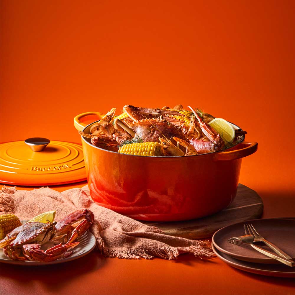 seafood casserole in orange french dutch oven - House
