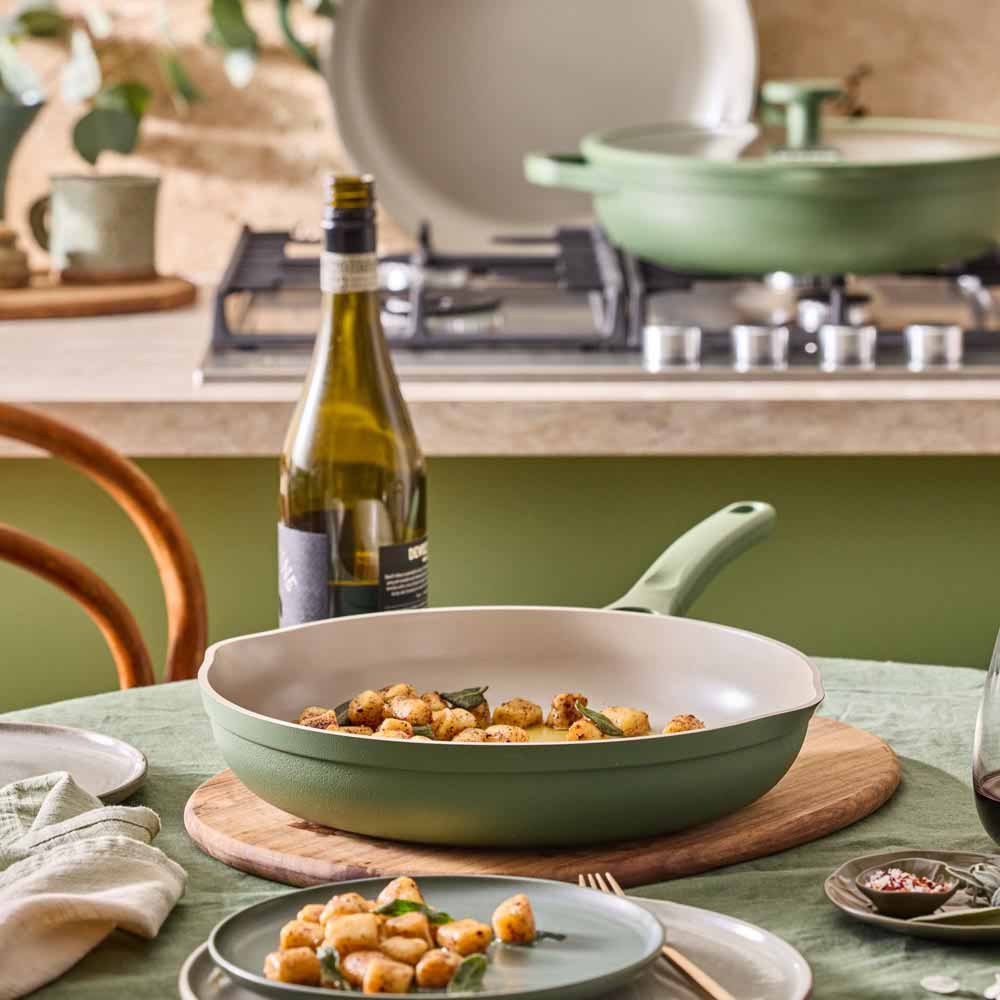 gnocchi with burnt butter sauce served from a green frypan