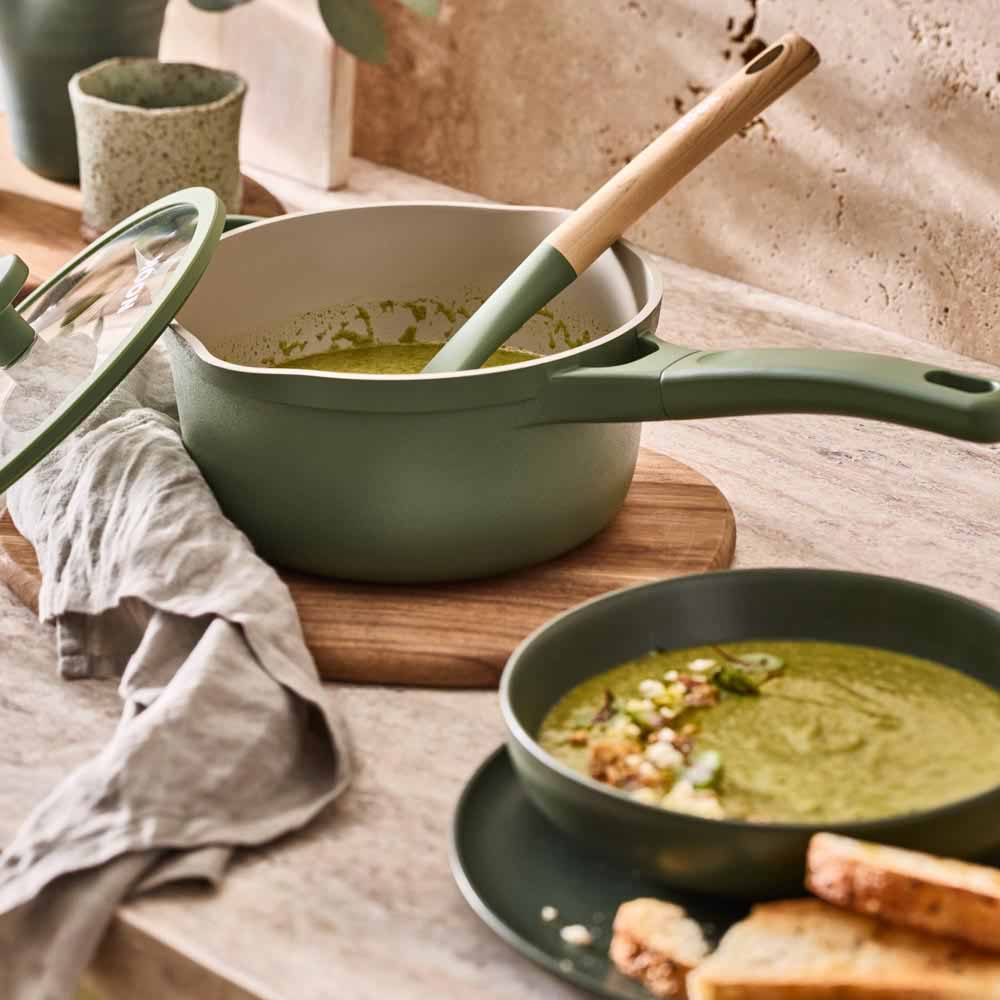 pea soup served from a green saucepan