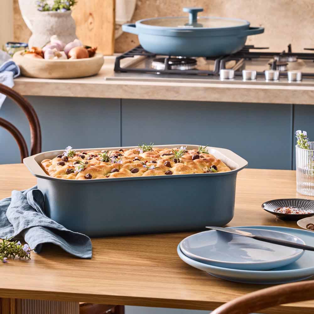 focaccia bread served from blue roasting pan 