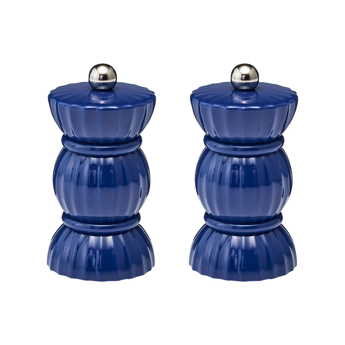 The navy Porto salt and pepper shakers are in the shape of a bon bon elevating your table setting.