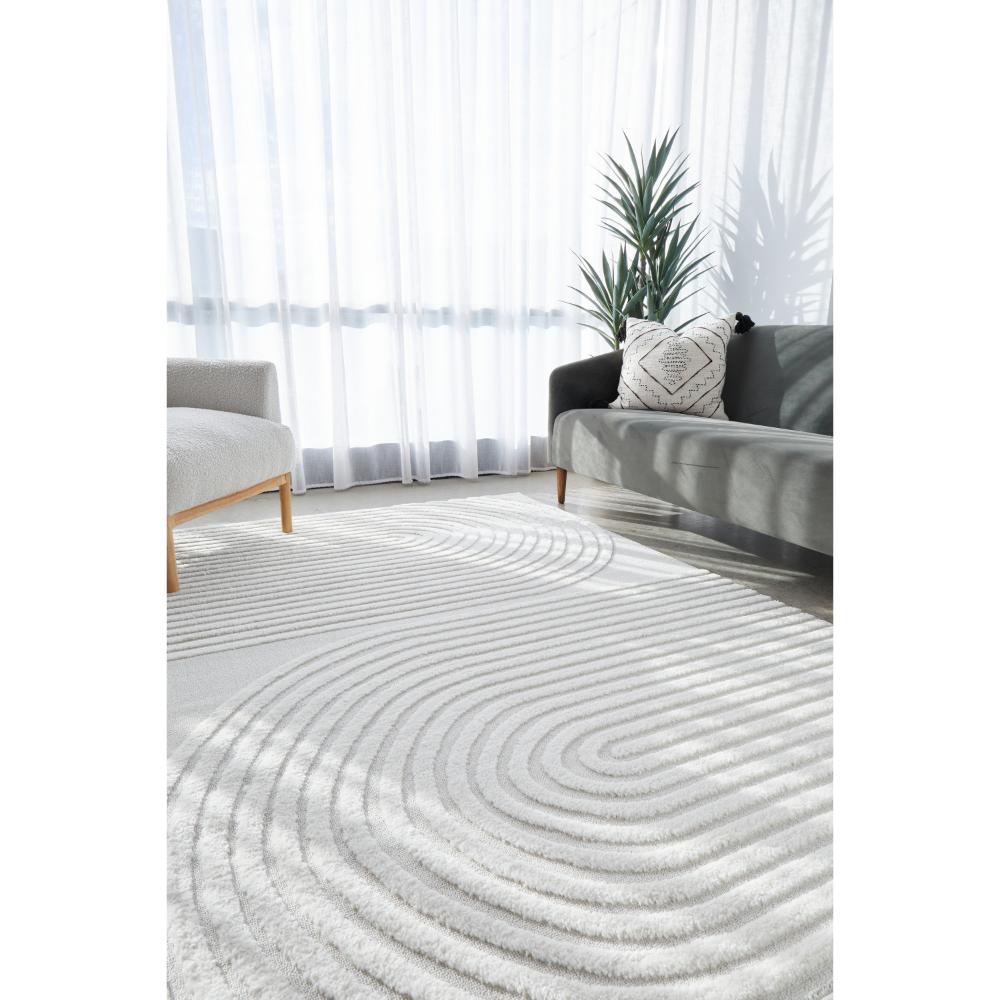 Rug Culture Lotus Abbey Rug in White at House. Rug with arch detail in lounge room